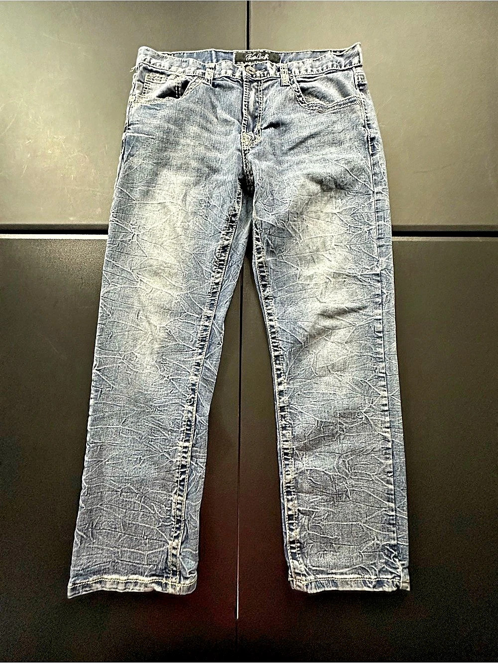 True Luck Blue denim with faded wash and distressed details Jeans size 34x30
